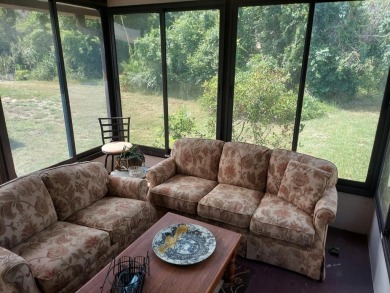 This home has great 'bones' with lots of potential for the right on Lakes at Leesburg Golf Course in Florida - for sale on GolfHomes.com, golf home, golf lot