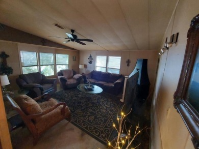 This home has great 'bones' with lots of potential for the right on Lakes at Leesburg Golf Course in Florida - for sale on GolfHomes.com, golf home, golf lot