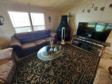 This home has great 'bones' with lots of potential for the right on Lakes at Leesburg Golf Course in Florida - for sale on GolfHomes.com, golf home, golf lot