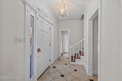 This lovely 2134 square foot home sits on a corner lot in a on Brandywine Bay Golf Club in North Carolina - for sale on GolfHomes.com, golf home, golf lot