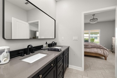 Upscale resort-style living awaits in Champions Gate. This on ChampionsGate Golf Resort in Florida - for sale on GolfHomes.com, golf home, golf lot