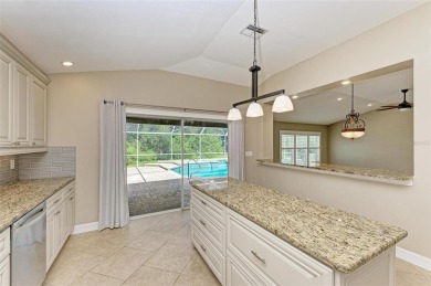 **BEAUTIFUL POOL HOME ,WITH HOT TUB, OVERLOOKING PRESERVE AND on Caloosa Greens Executive Golf Course in Florida - for sale on GolfHomes.com, golf home, golf lot