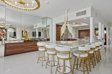 LOCATION & VIEWS. Be wowed in this stunning condo, where luxury on Desert Island Golf and Country Club in California - for sale on GolfHomes.com, golf home, golf lot