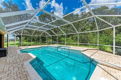 **BEAUTIFUL POOL HOME ,WITH HOT TUB, OVERLOOKING PRESERVE AND on Caloosa Greens Executive Golf Course in Florida - for sale on GolfHomes.com, golf home, golf lot