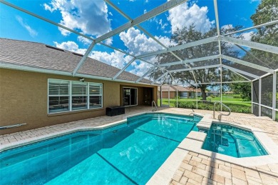 **BEAUTIFUL POOL HOME ,WITH HOT TUB, OVERLOOKING PRESERVE AND on Caloosa Greens Executive Golf Course in Florida - for sale on GolfHomes.com, golf home, golf lot