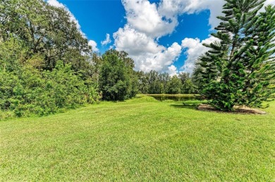 **BEAUTIFUL POOL HOME ,WITH HOT TUB, OVERLOOKING PRESERVE AND on Caloosa Greens Executive Golf Course in Florida - for sale on GolfHomes.com, golf home, golf lot