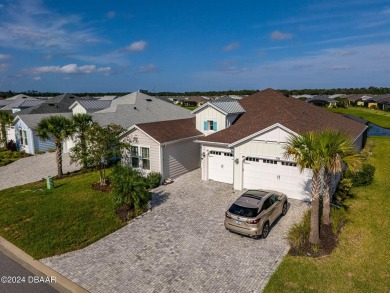 Waterfront Aruba Island Collection Home in sought after Latitude on LPGA International Golf Course in Florida - for sale on GolfHomes.com, golf home, golf lot