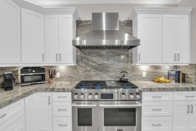 4 Bedroom, 4.5 Bath home with heated pool & spa features 2 large on Pine Tree Golf Club in Florida - for sale on GolfHomes.com, golf home, golf lot