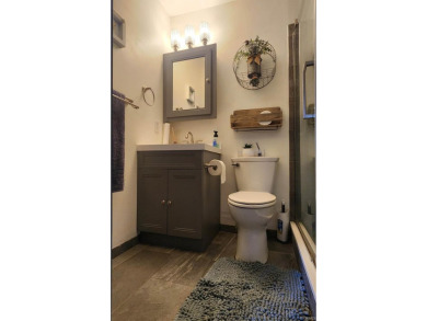 Enjoy the beautiful open views from this 3 bedroom, one and a on Coyote Creek Golf Club in Indiana - for sale on GolfHomes.com, golf home, golf lot