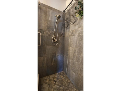 Enjoy the beautiful open views from this 3 bedroom, one and a on Coyote Creek Golf Club in Indiana - for sale on GolfHomes.com, golf home, golf lot