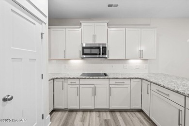 Luxurious Living in the Gated Community of Appleton South within on Kings Grant Golf and Country Club in North Carolina - for sale on GolfHomes.com, golf home, golf lot