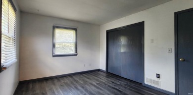 Enjoy the beautiful open views from this 3 bedroom, one and a on Coyote Creek Golf Club in Indiana - for sale on GolfHomes.com, golf home, golf lot