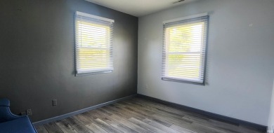 Enjoy the beautiful open views from this 3 bedroom, one and a on Coyote Creek Golf Club in Indiana - for sale on GolfHomes.com, golf home, golf lot