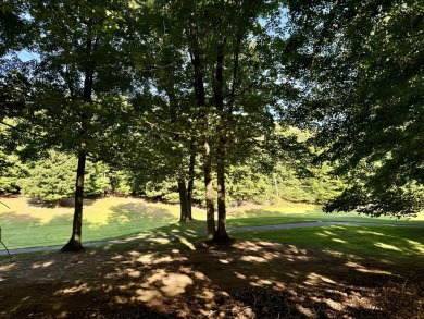 Nestled on the picturesque 11th fairway of the renowned St. Ives on St. Ives Golf Club in Michigan - for sale on GolfHomes.com, golf home, golf lot