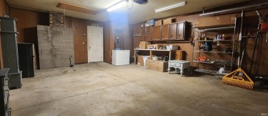 Enjoy the beautiful open views from this 3 bedroom, one and a on Coyote Creek Golf Club in Indiana - for sale on GolfHomes.com, golf home, golf lot
