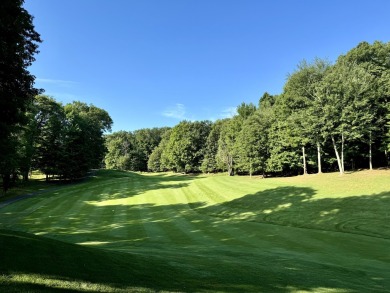 Nestled on the picturesque 11th fairway of the renowned St. Ives on St. Ives Golf Club in Michigan - for sale on GolfHomes.com, golf home, golf lot