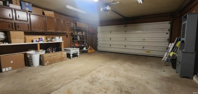 Enjoy the beautiful open views from this 3 bedroom, one and a on Coyote Creek Golf Club in Indiana - for sale on GolfHomes.com, golf home, golf lot