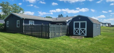 Enjoy the beautiful open views from this 3 bedroom, one and a on Coyote Creek Golf Club in Indiana - for sale on GolfHomes.com, golf home, golf lot
