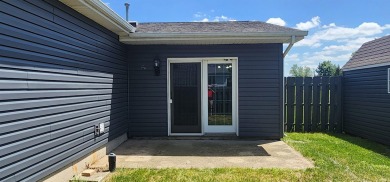 Enjoy the beautiful open views from this 3 bedroom, one and a on Coyote Creek Golf Club in Indiana - for sale on GolfHomes.com, golf home, golf lot