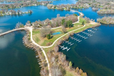 Nestled on the picturesque 11th fairway of the renowned St. Ives on St. Ives Golf Club in Michigan - for sale on GolfHomes.com, golf home, golf lot