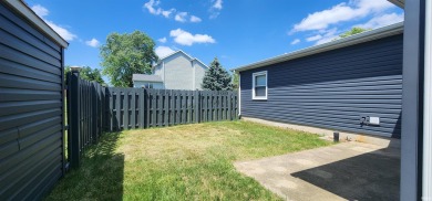 Enjoy the beautiful open views from this 3 bedroom, one and a on Coyote Creek Golf Club in Indiana - for sale on GolfHomes.com, golf home, golf lot