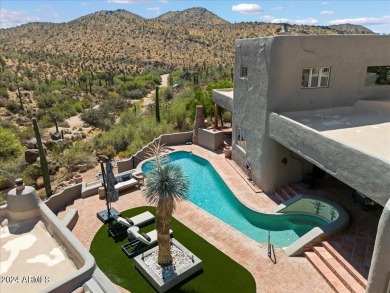 Discover the epitome of luxury living w/this stunning custom on Troon Country Club in Arizona - for sale on GolfHomes.com, golf home, golf lot