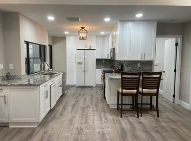 VERY DESIRABLE GATED COMMUNITY OF EAST LAKE WOODLANDS, CORNER on East Lake Woodlands Country Club in Florida - for sale on GolfHomes.com, golf home, golf lot