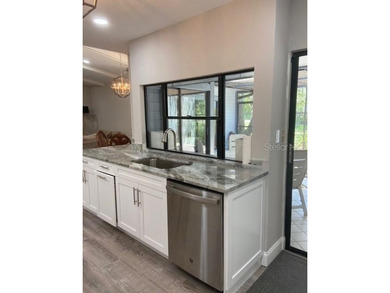 VERY DESIRABLE GATED COMMUNITY OF EAST LAKE WOODLANDS, CORNER on East Lake Woodlands Country Club in Florida - for sale on GolfHomes.com, golf home, golf lot