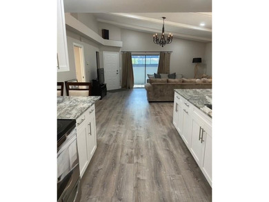 VERY DESIRABLE GATED COMMUNITY OF EAST LAKE WOODLANDS, CORNER on East Lake Woodlands Country Club in Florida - for sale on GolfHomes.com, golf home, golf lot