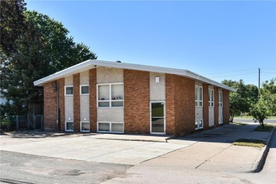 Well-maintained office building ideal for various professional on Columbia Golf Club in Minnesota - for sale on GolfHomes.com, golf home, golf lot