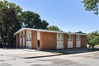 Well-maintained office building ideal for various professional on Columbia Golf Club in Minnesota - for sale on GolfHomes.com, golf home, golf lot