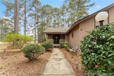 Nestled on the picturesque 10th fairway, this beautiful townhome on Gates Four Golf and Country Club in North Carolina - for sale on GolfHomes.com, golf home, golf lot