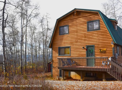 This charming home is nestled on a quiet treed street, offers a on Cedar Creek Golf Course in Wyoming - for sale on GolfHomes.com, golf home, golf lot