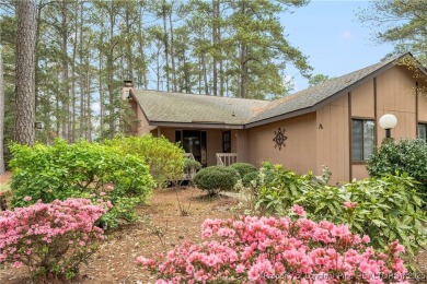 Nestled on the picturesque 10th fairway, this beautiful townhome on Gates Four Golf and Country Club in North Carolina - for sale on GolfHomes.com, golf home, golf lot