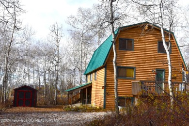 This charming home is nestled on a quiet treed street, offers a on Cedar Creek Golf Course in Wyoming - for sale on GolfHomes.com, golf home, golf lot