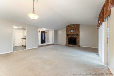 Nestled on the picturesque 10th fairway, this beautiful townhome on Gates Four Golf and Country Club in North Carolina - for sale on GolfHomes.com, golf home, golf lot