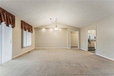 Nestled on the picturesque 10th fairway, this beautiful townhome on Gates Four Golf and Country Club in North Carolina - for sale on GolfHomes.com, golf home, golf lot