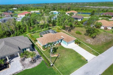 A GOLFER'S DREAM HOME! This updated pool home in Rotonda West on Rotonda Golf and Country Club - Long Marsh  in Florida - for sale on GolfHomes.com, golf home, golf lot