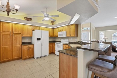 A GOLFER'S DREAM HOME! This updated pool home in Rotonda West on Rotonda Golf and Country Club - Long Marsh  in Florida - for sale on GolfHomes.com, golf home, golf lot