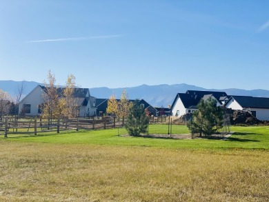 Experience breathtaking mountain views and tranquil living in on The Powder Horn Golf Club - Mountain in Wyoming - for sale on GolfHomes.com, golf home, golf lot