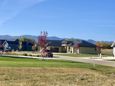 Experience breathtaking mountain views and tranquil living in on The Powder Horn Golf Club - Mountain in Wyoming - for sale on GolfHomes.com, golf home, golf lot