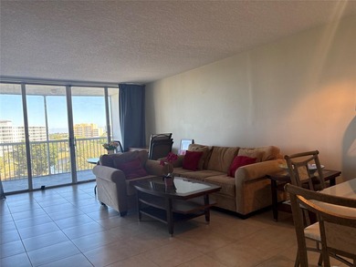 Escape to this spacious 2BR/2BA condo situated in a private on Palm-Aire Country Club and Resort - Palms in Florida - for sale on GolfHomes.com, golf home, golf lot