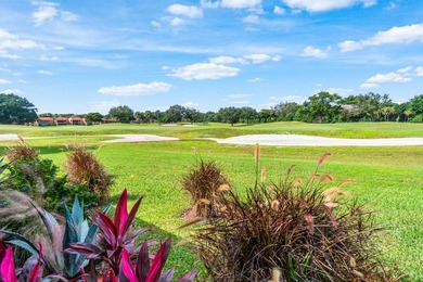 Beautiful golf course views surround this bright and inviting on Indian Spring Golf and Country Club in Florida - for sale on GolfHomes.com, golf home, golf lot