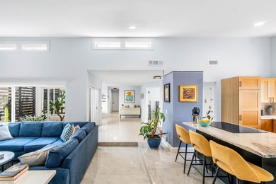 Beautiful golf course views surround this bright and inviting on Indian Spring Golf and Country Club in Florida - for sale on GolfHomes.com, golf home, golf lot