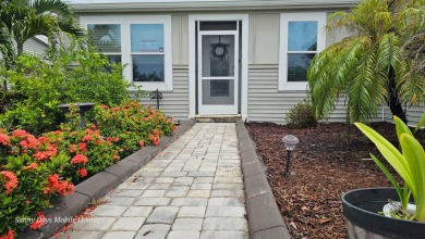 Looking for a Palm Harbor Wellington Model located in the on The Riverside Golf Club in Florida - for sale on GolfHomes.com, golf home, golf lot