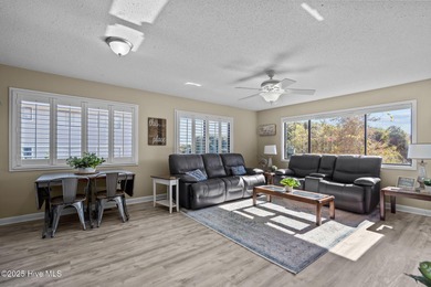 Uncover the ultimate beach getaway in this highly desirable on Oak Island Golf Club in North Carolina - for sale on GolfHomes.com, golf home, golf lot