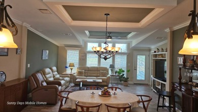 Looking for a Palm Harbor Wellington Model located in the on The Riverside Golf Club in Florida - for sale on GolfHomes.com, golf home, golf lot