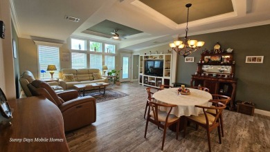 Looking for a Palm Harbor Wellington Model located in the on The Riverside Golf Club in Florida - for sale on GolfHomes.com, golf home, golf lot