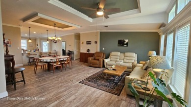 Looking for a Palm Harbor Wellington Model located in the on The Riverside Golf Club in Florida - for sale on GolfHomes.com, golf home, golf lot
