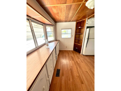 Come see this cozy 2 bed, 1 bath mobile home in the Highland on DeBary Golf and Country Club in Florida - for sale on GolfHomes.com, golf home, golf lot